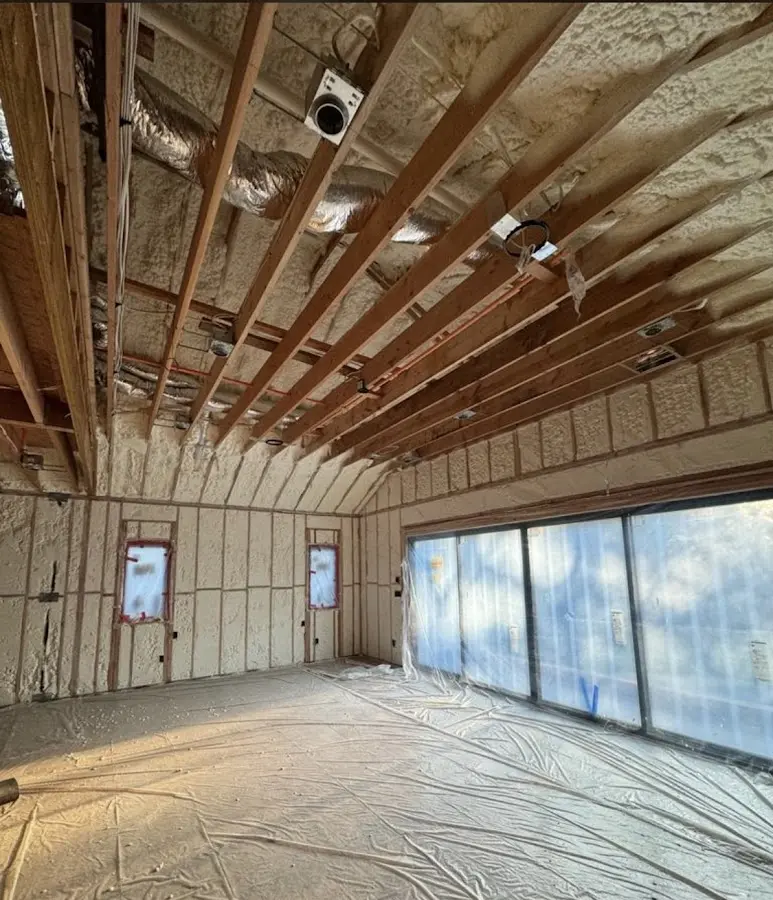 Interior walls and ceiling insulated with spray foam during new construction in Spanish Fort